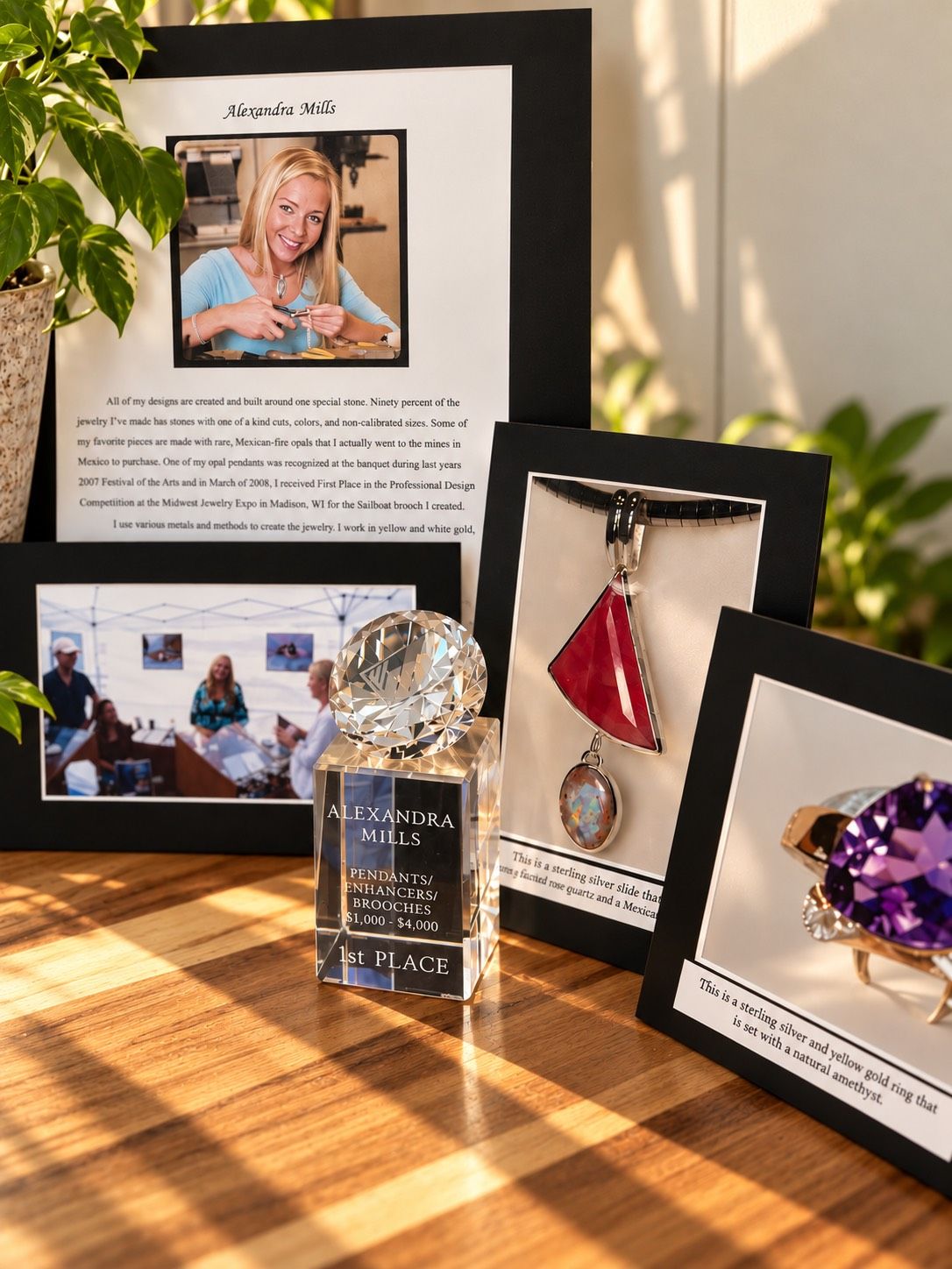 A framed award and old show photos from Alex's early jewelry career